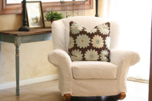 chair slipcover made from a queen matelasse bedspread