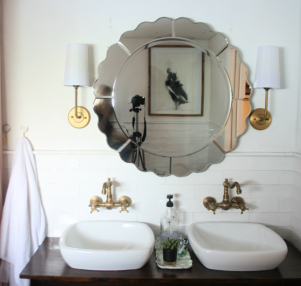 How to hang a bathroom mirror over tile wainscoting.