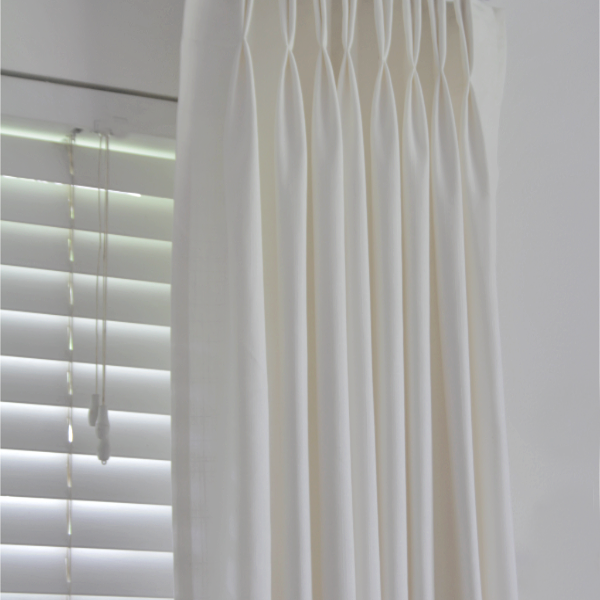 ikea hack…how to make ready made Ikea Ritva curtains look like expensive custom drapes.