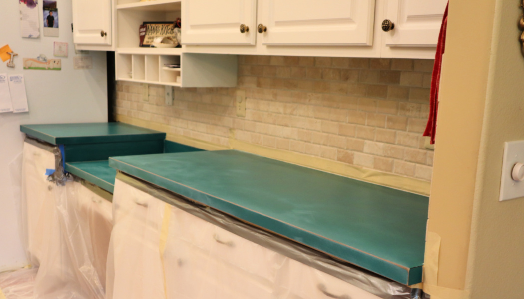 Epoxy pour to cover nasty old laminate countertops! Kitchen is a